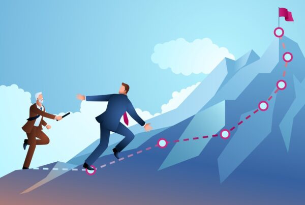 Businessman passing the baton to another businessman